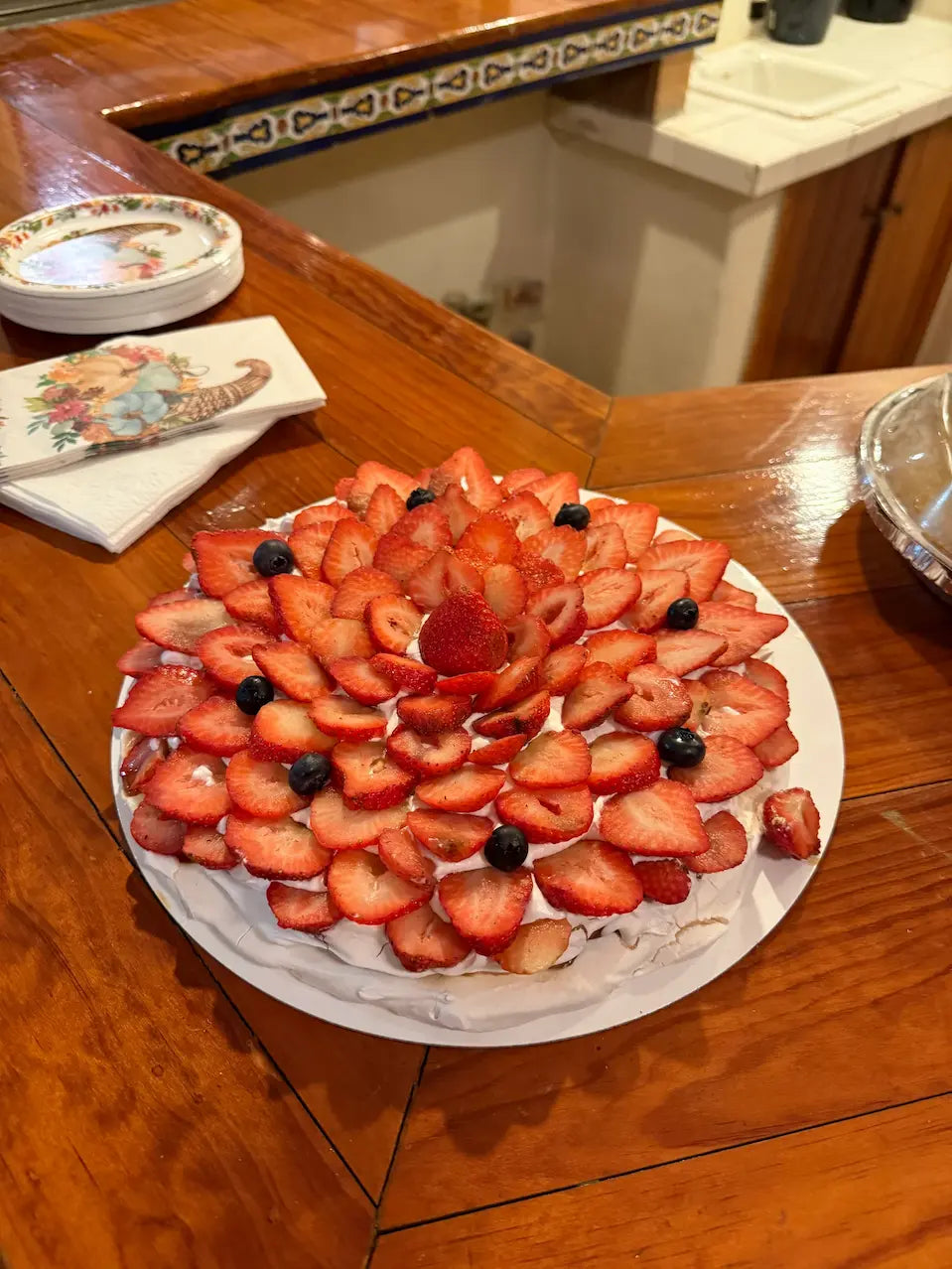 Freshly made strawberry pavlova cake captured in a customer review, reflecting the best pavlova bakery near me for fresh fruit pavlovas
