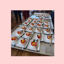Bulk mini pavlova cake order with dozens of trays in production, perfect for catering events, weddings, or holidays